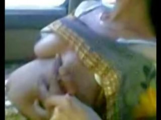Handsome grown Indian Aunty clip Her Boobs T Someone